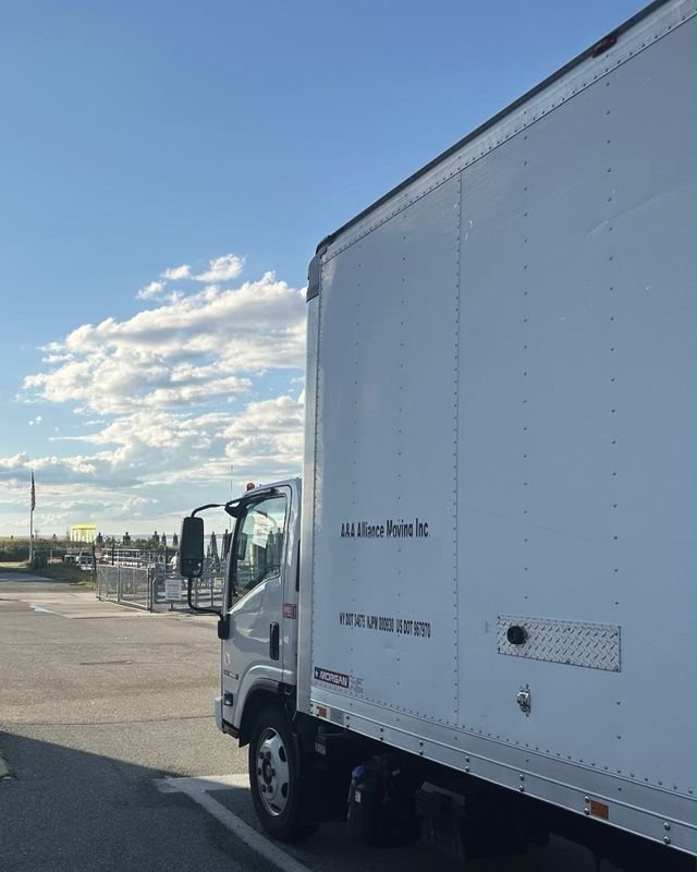 One of our trucks, with A&A Alliance Moving Inc and its license numbers on the side