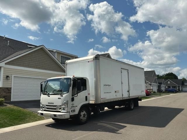 Our box truck parked by a row of townhouses
